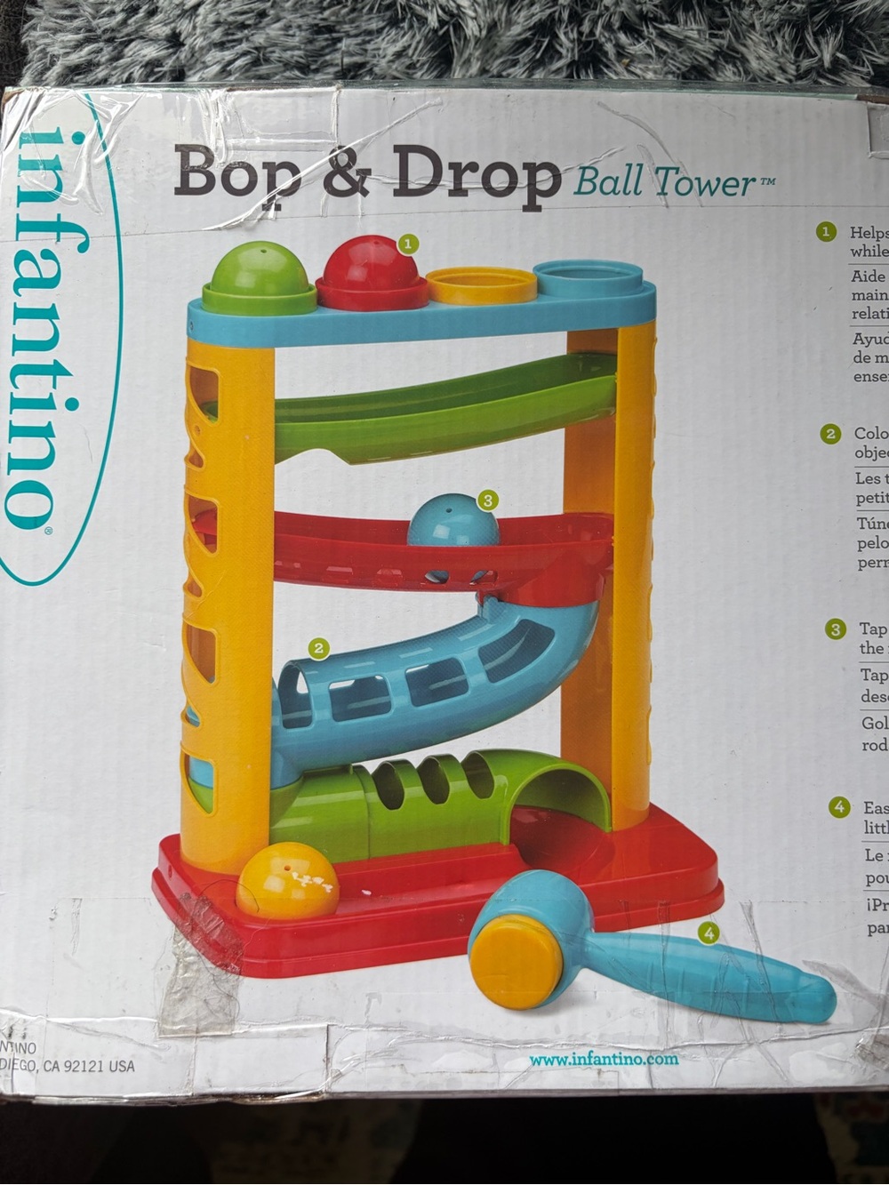 Infantino Colorful Ball Bop & Drop Tower - Red, Yellow, Blue, Green